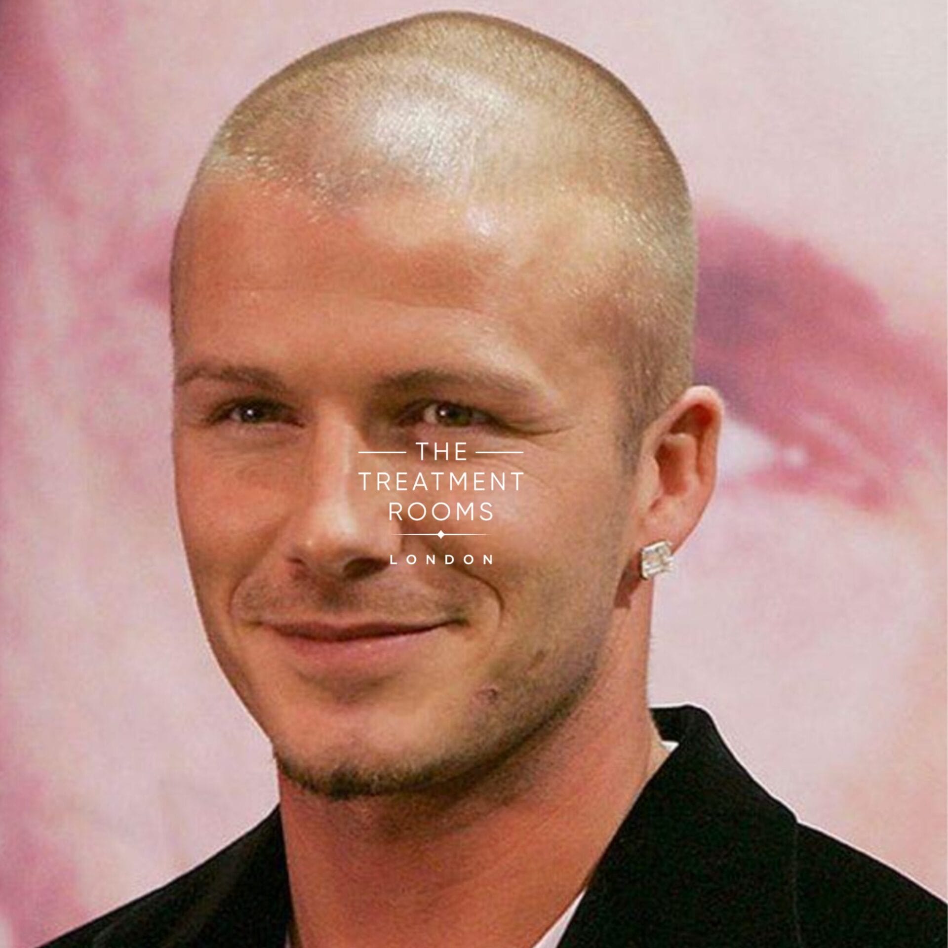 david becham with a shaven hair style