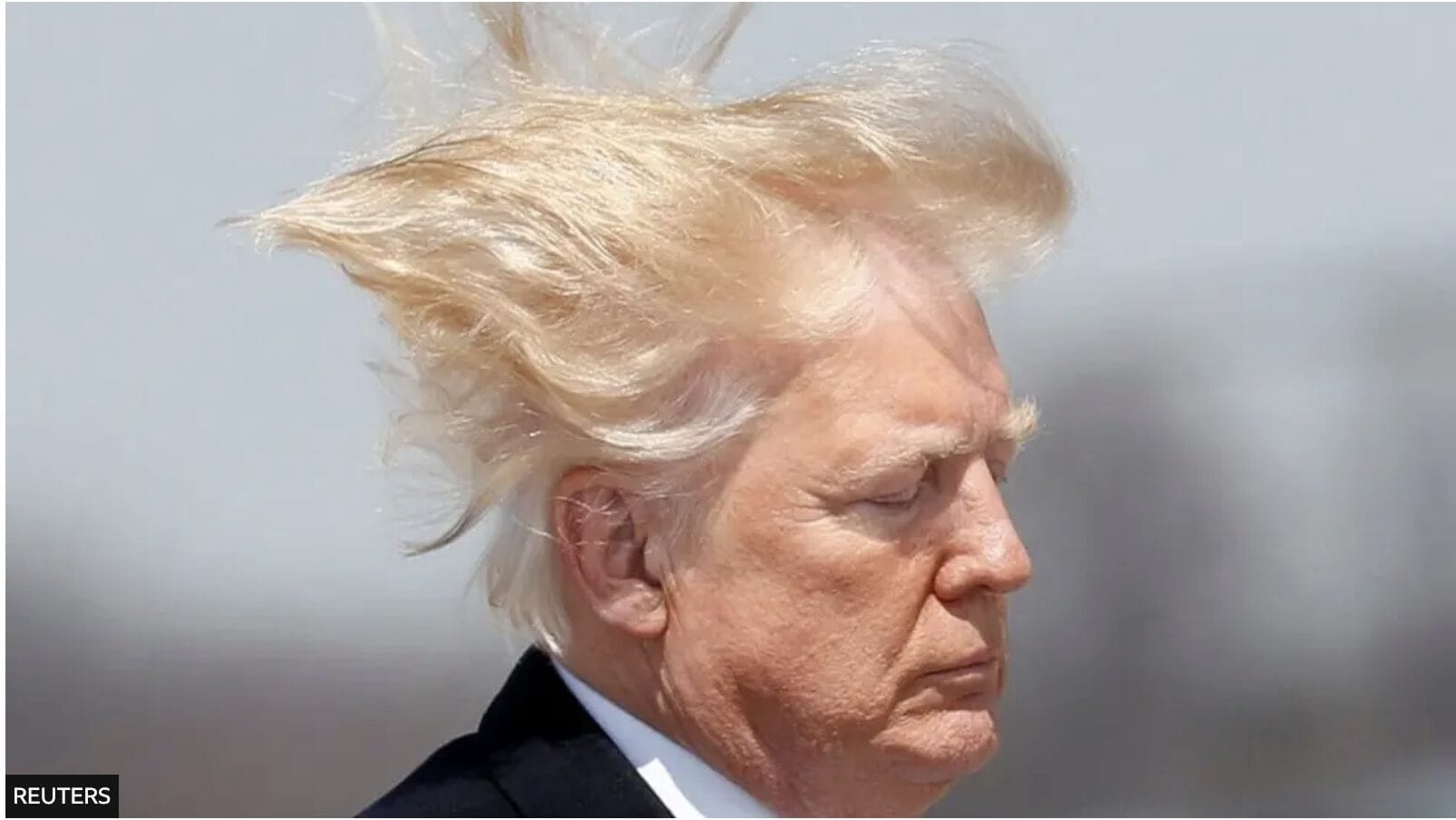image showing President Donal Trumps hair being blown by wind