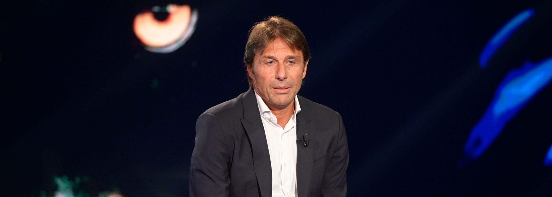 antonio conte with a fuller hair after having his hair transplant